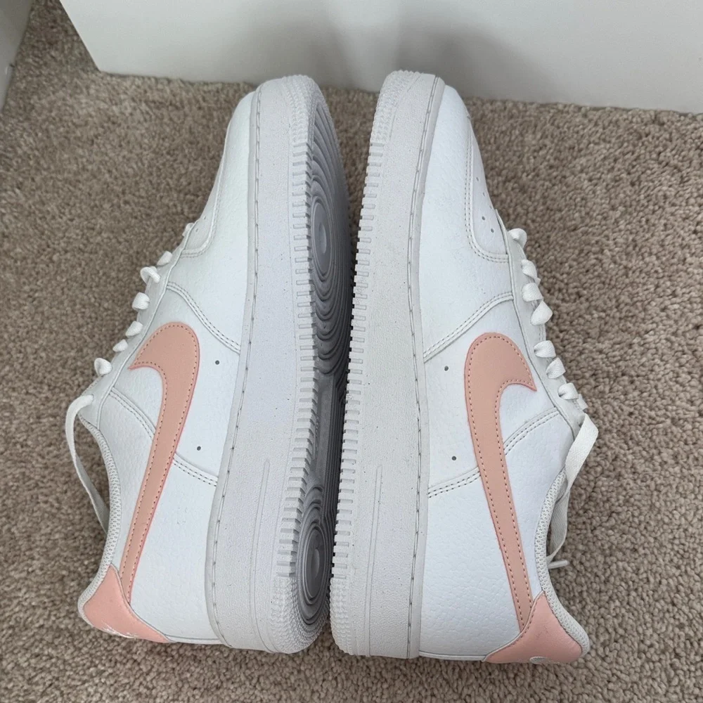 Nike White Leather Low-Top Sneakers with Pink Swoosh